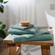 Serviette de bain en coton biologique couleur bleu turquoise